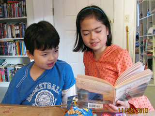 two students reading together